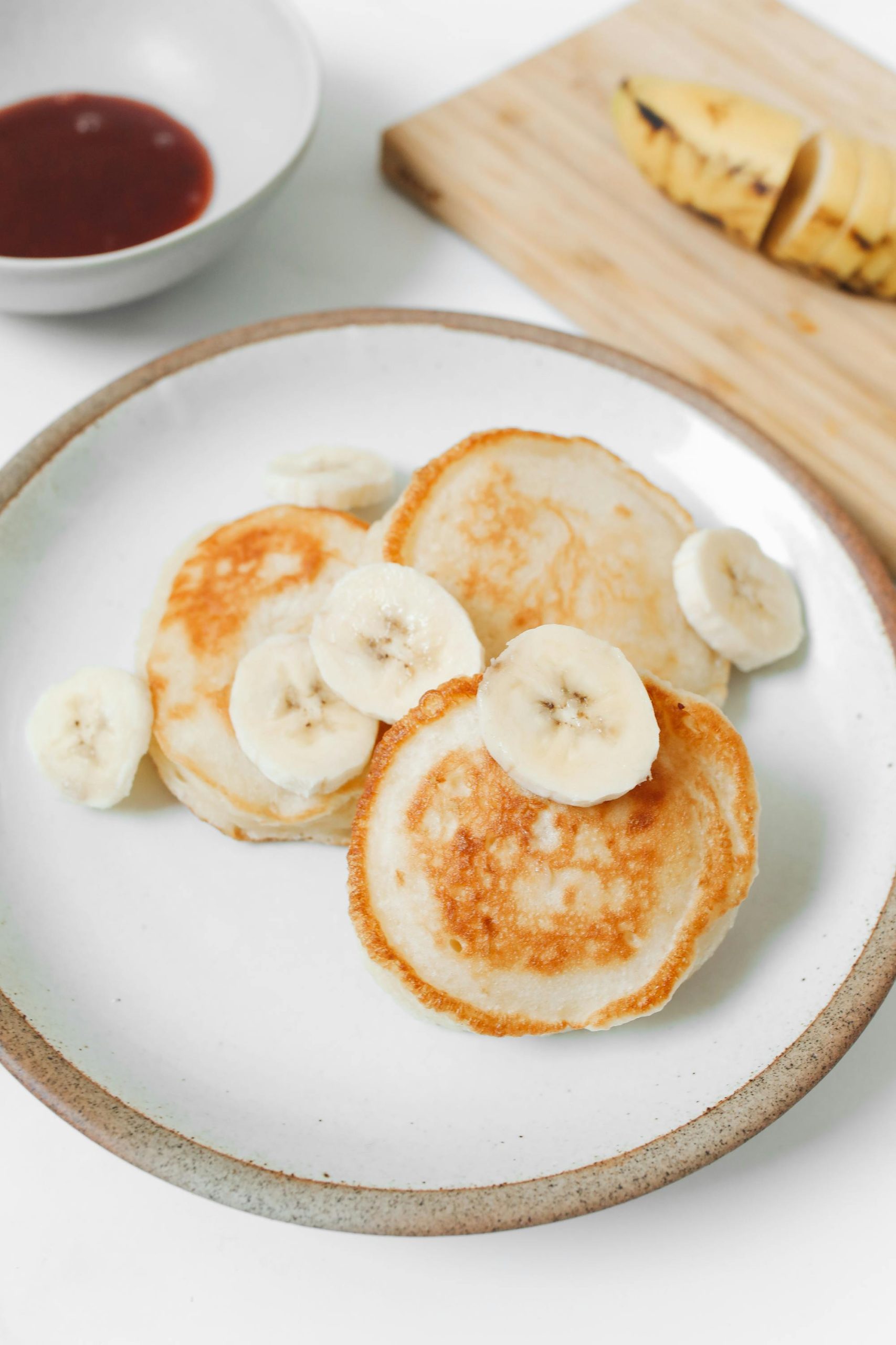 pancakes served with banana slices