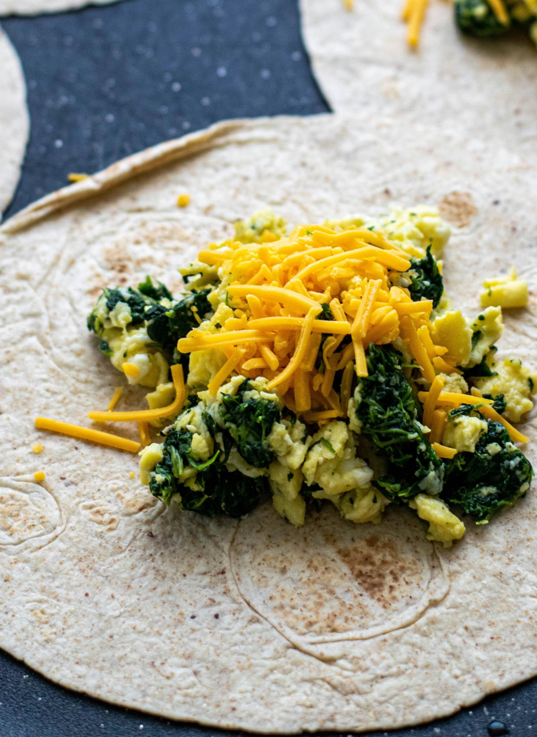 egg , spinach and cheese wrap